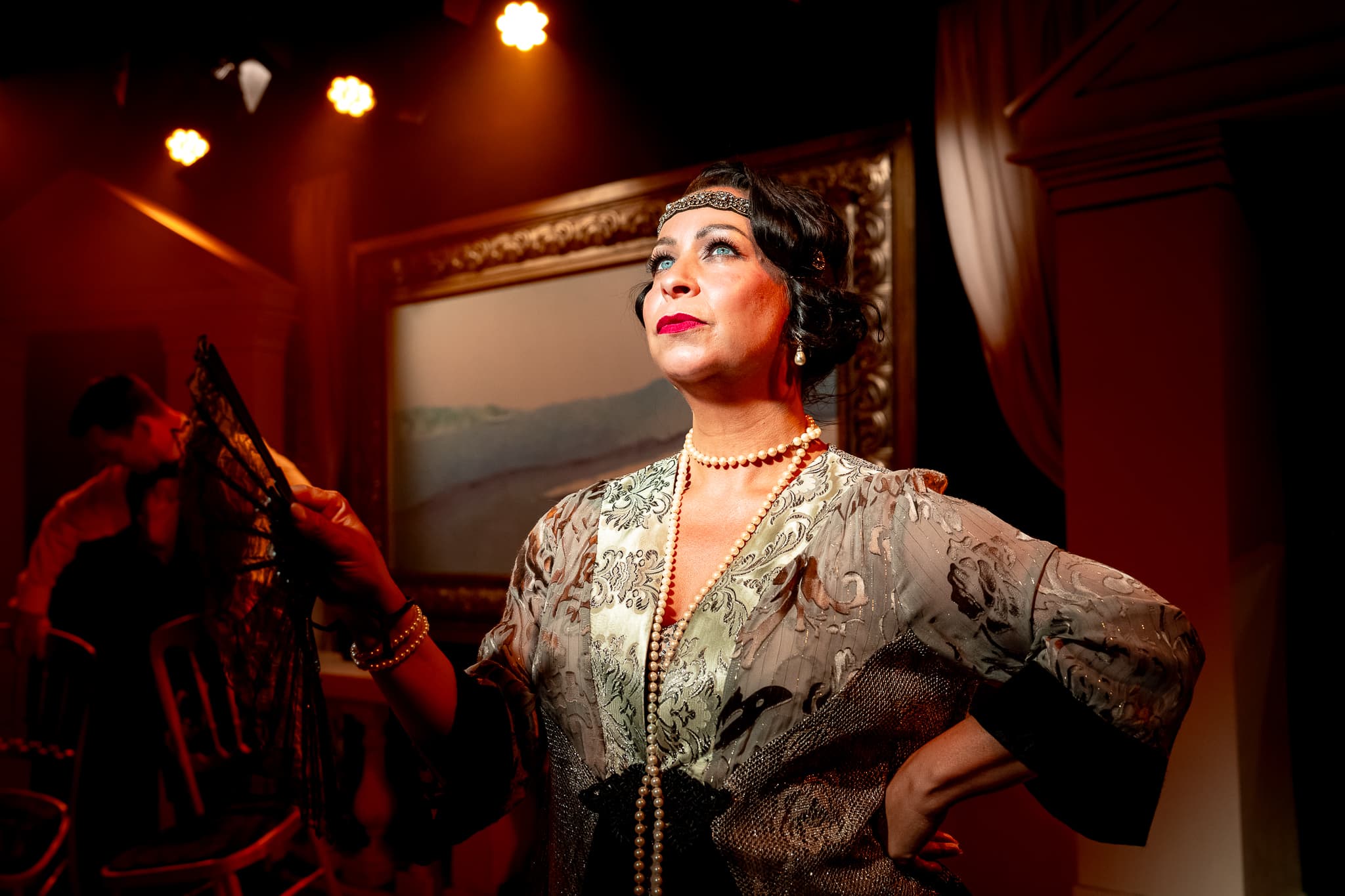 A performer in period costume during Extraordinary Women