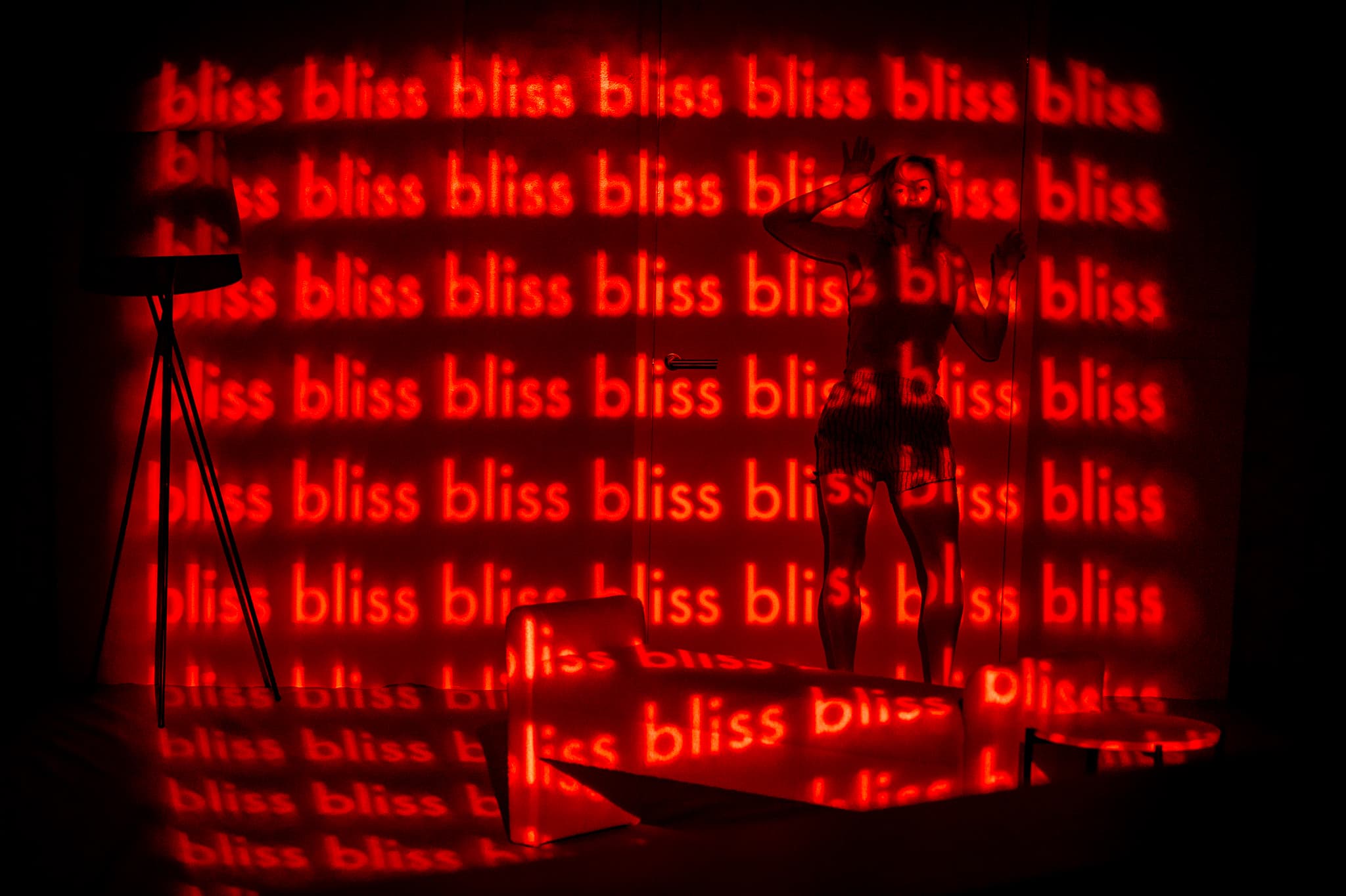 A red-lit scene from Girl In The Machine