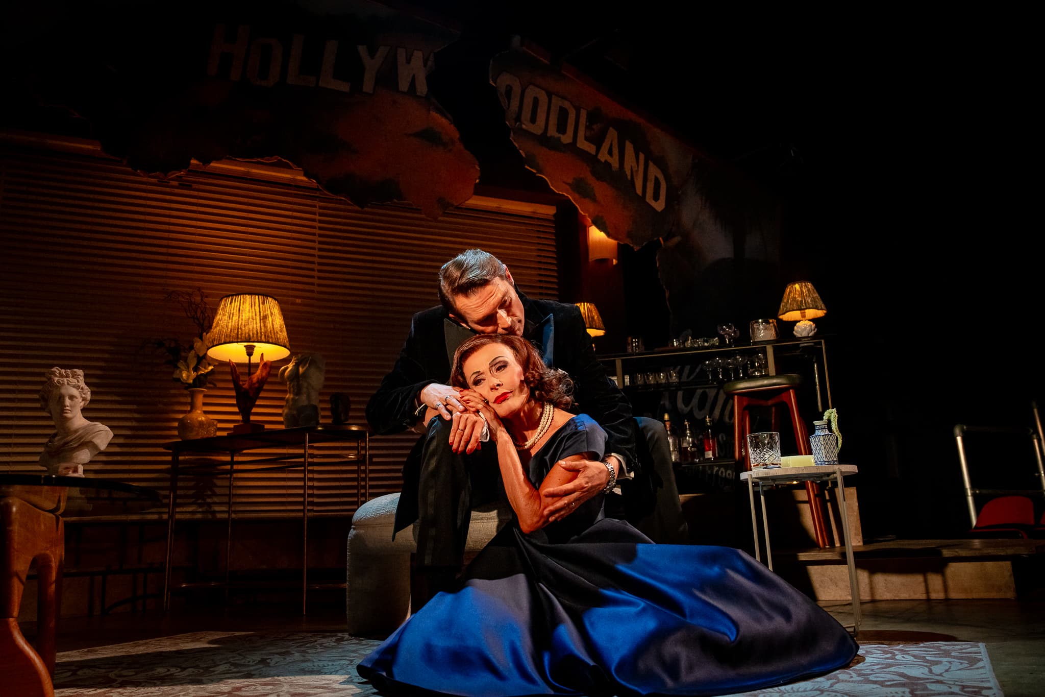 A close dramatic scene between two performers in The Code