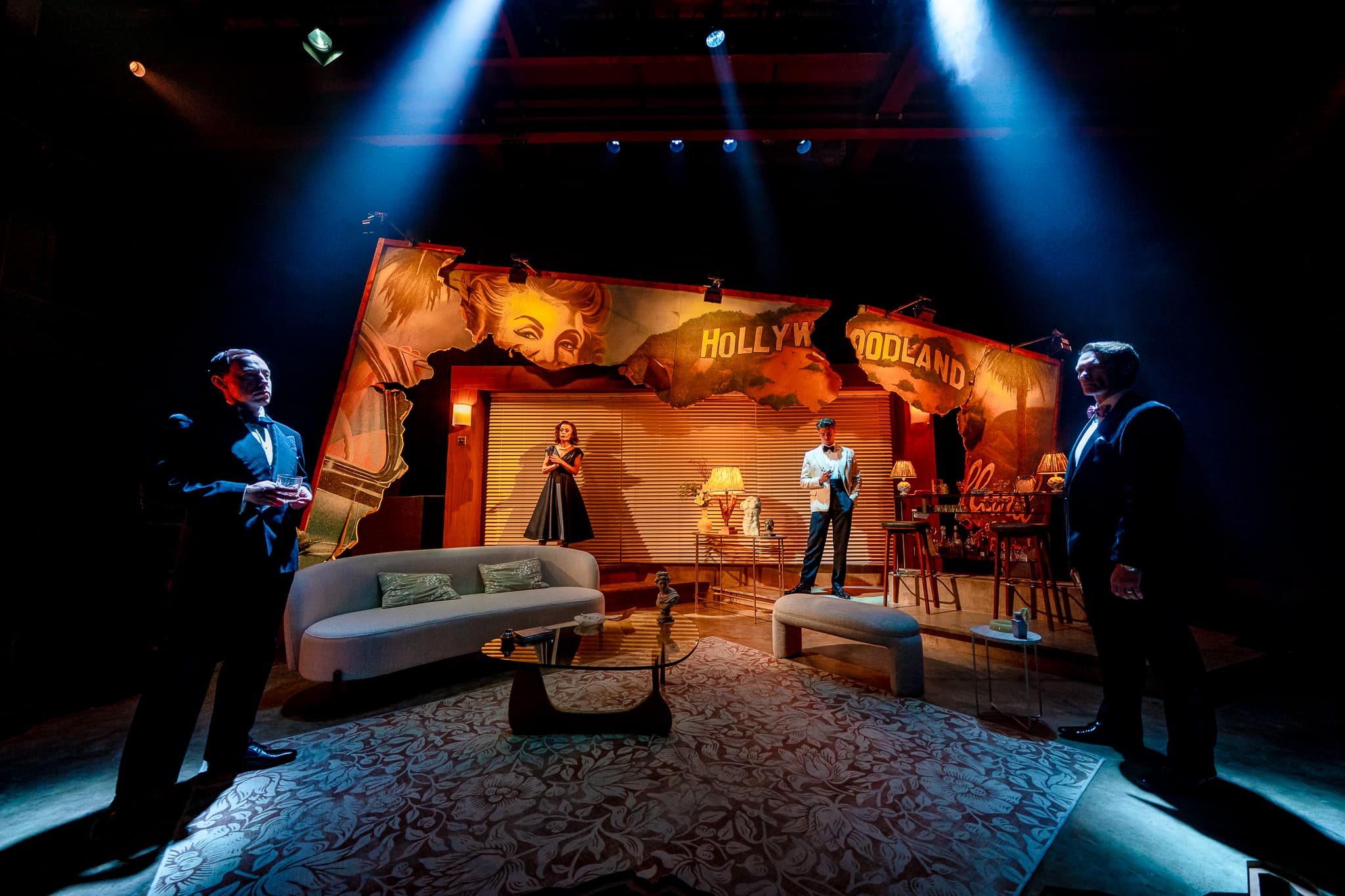 The company positioned across the stage in The Code