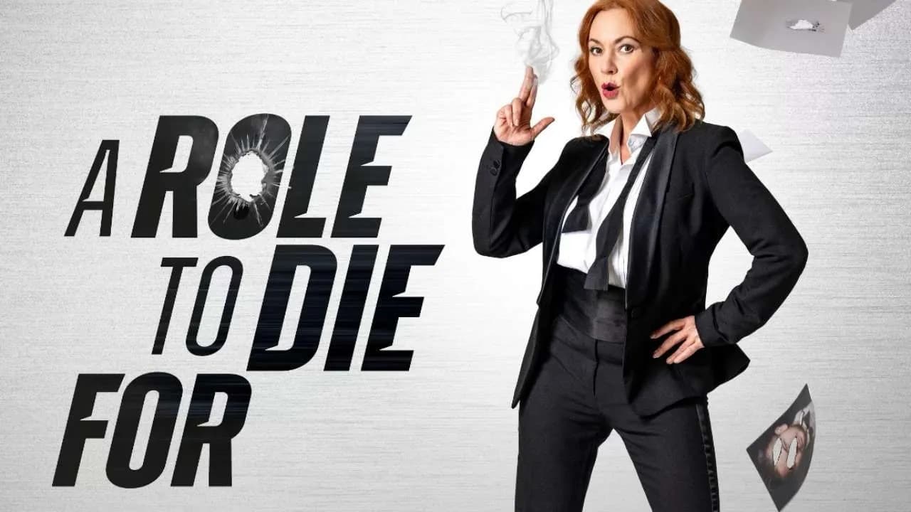 Suited performer makes a finger-gun with smoke beside bold title; bullet-holed lettering and flying papers on a clean backdrop.